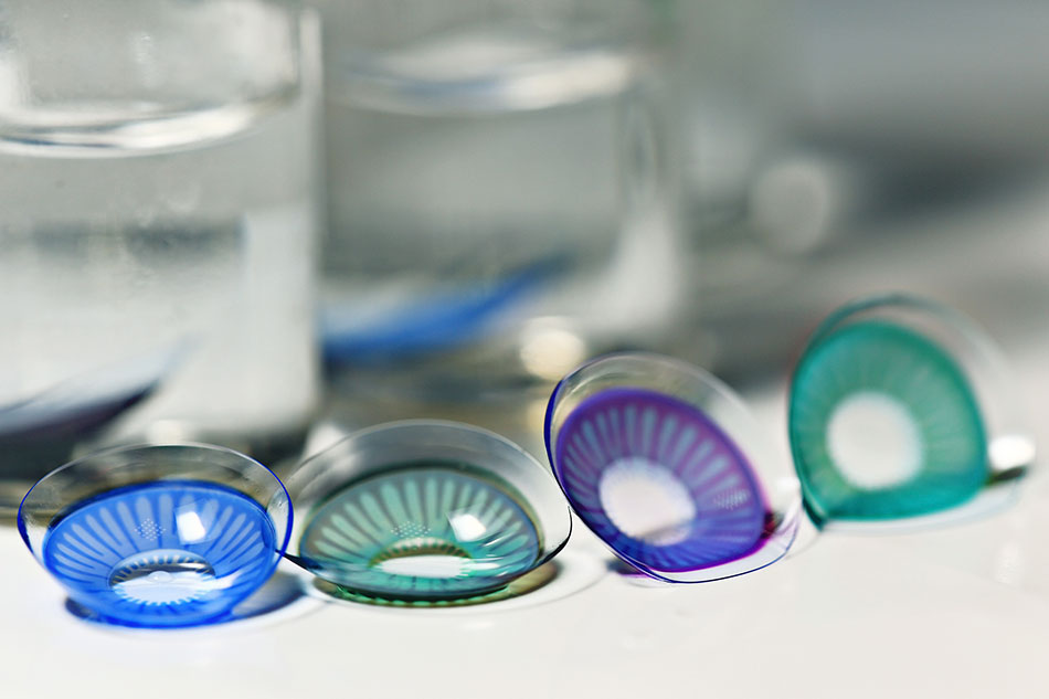 4 colored contact lenses in shades of blue and green