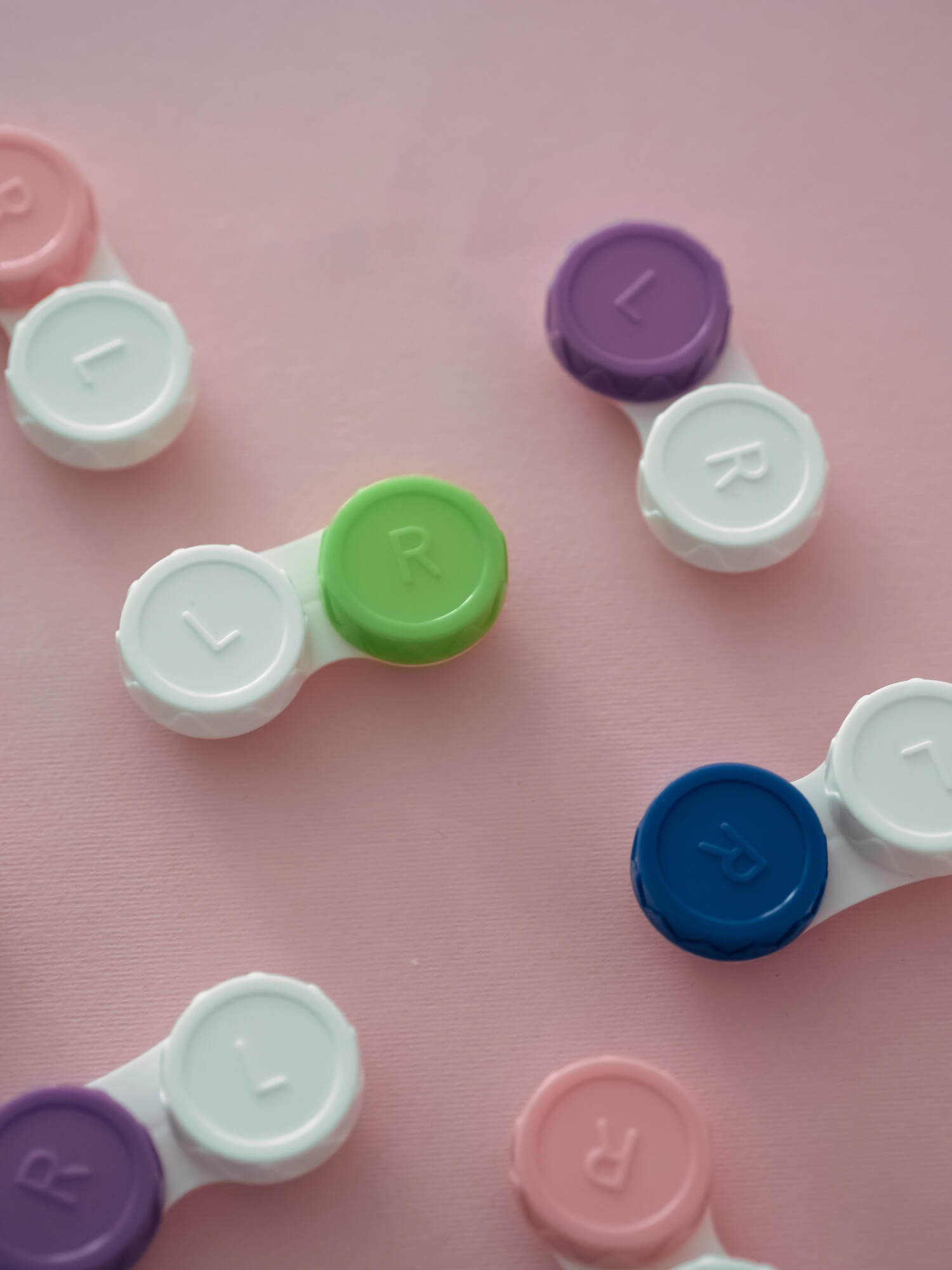 Colorful contact lens cases for daily and monthly lenses available to buy online with FSA or HSA