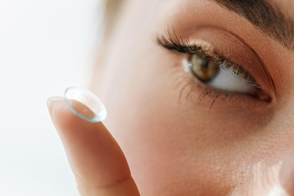 woman reusing one-day contact lens