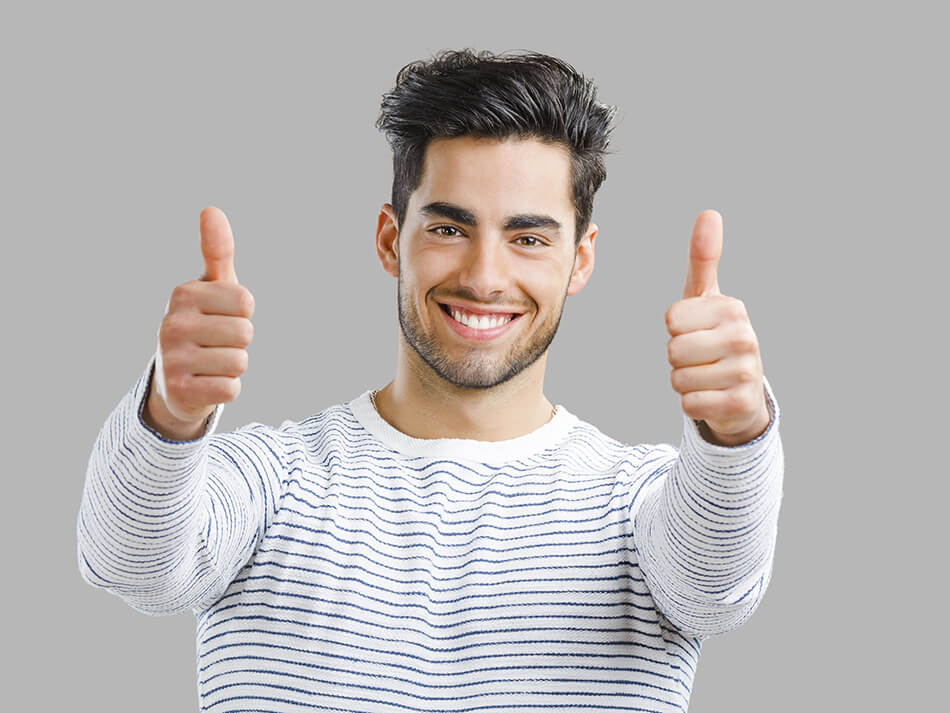 happy man wearing giving two thumbs up