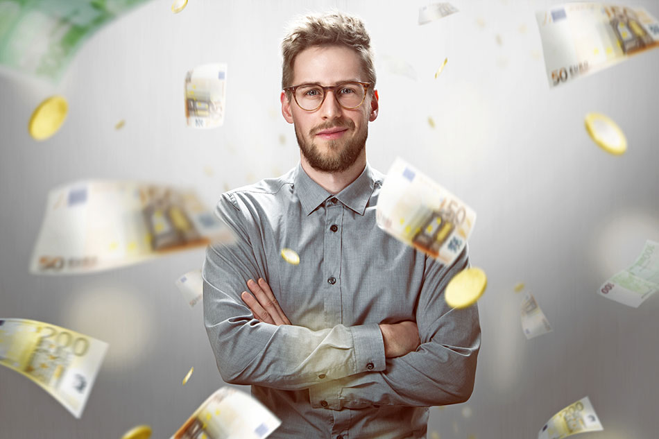 man with glasses standing and money flight around him