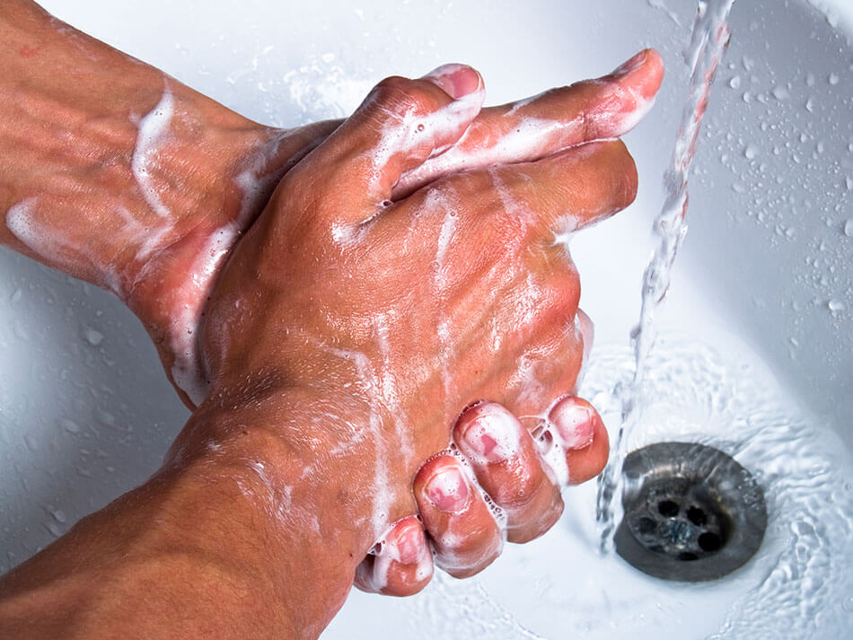 man washing hands