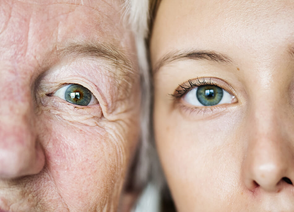 old woman and young woman with blue eyes