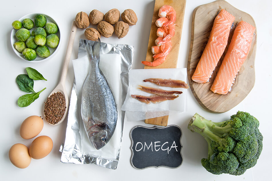 selection of fish and vegetables containing omega-3 fatty acids