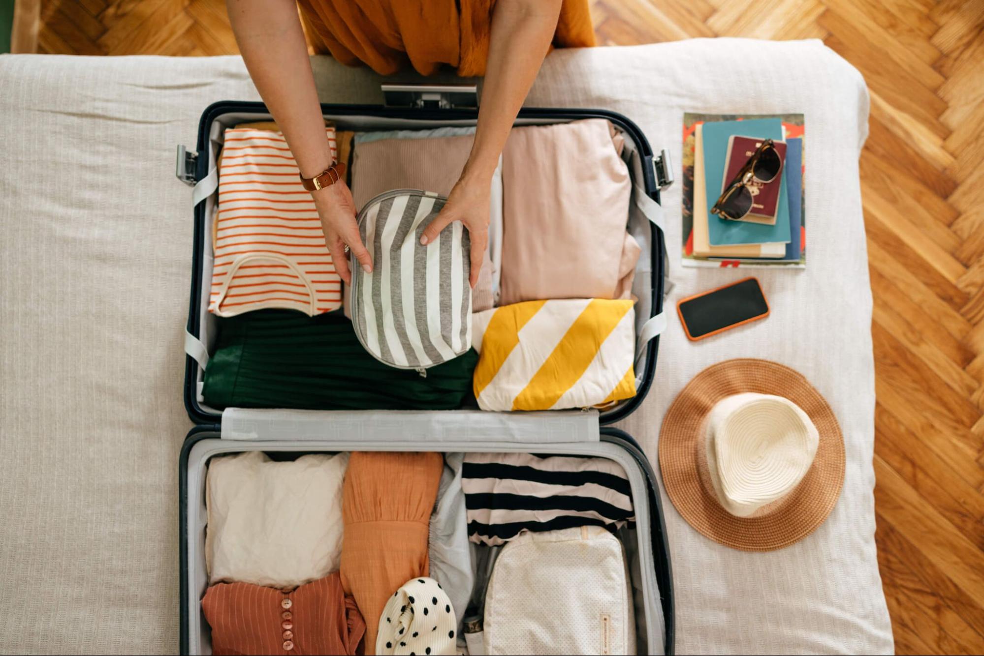 How to pack sunglasses for travel inside an organized suitcase