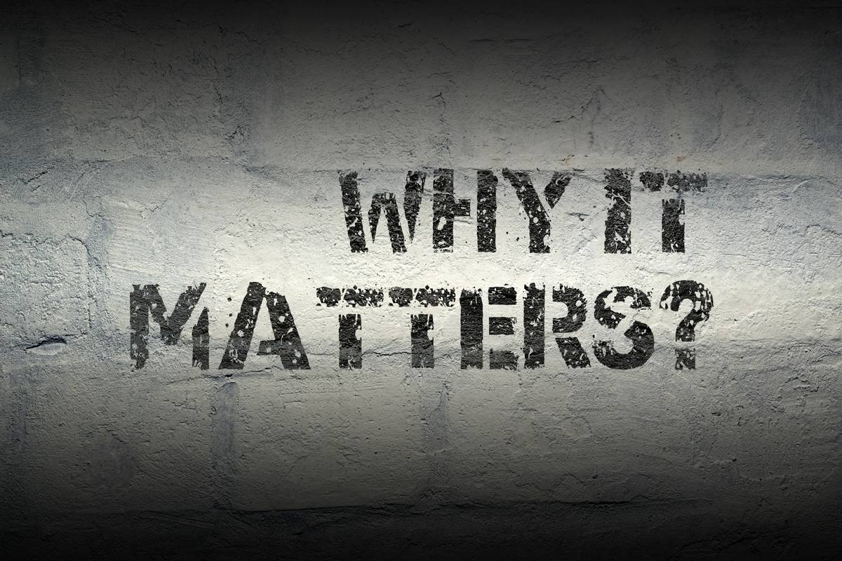 White brick wall with painted letters asking “Why it matters?”