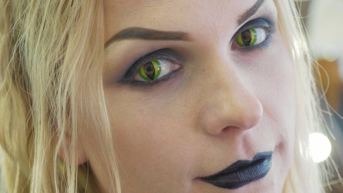 woman wearing cat eye color contacts lenses