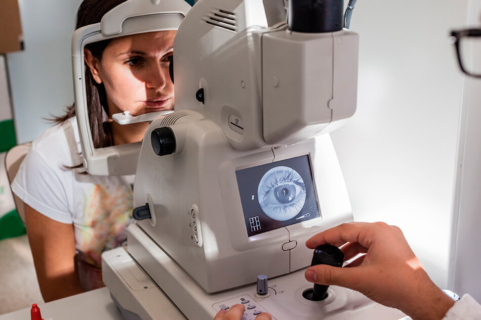 eye doctor performing contact lense exam and checking for color blindness