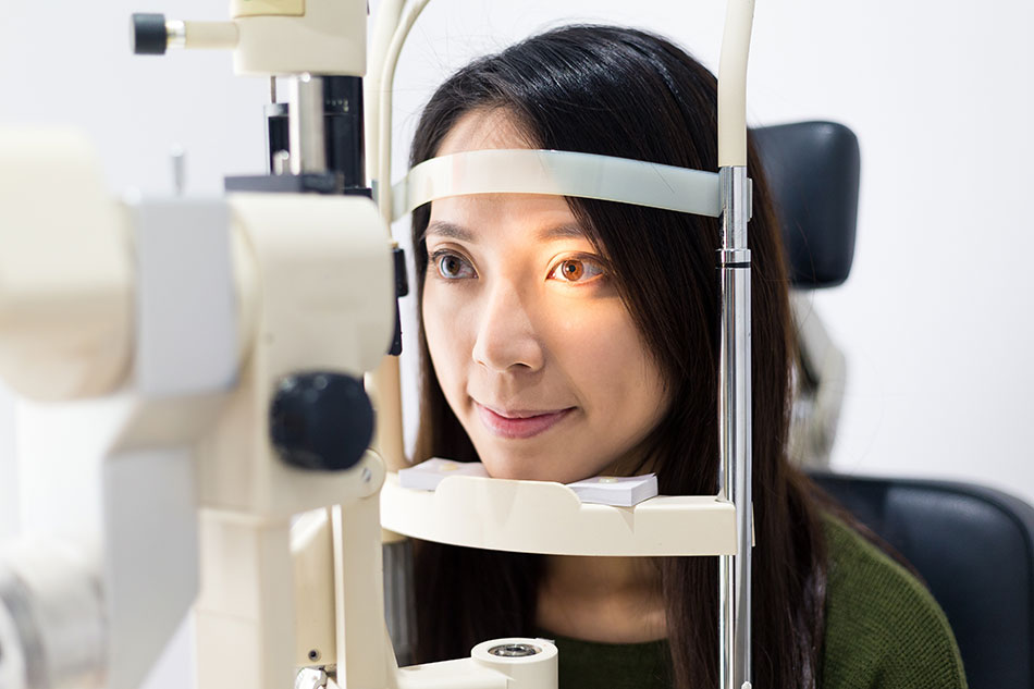 Woman getting eye exam