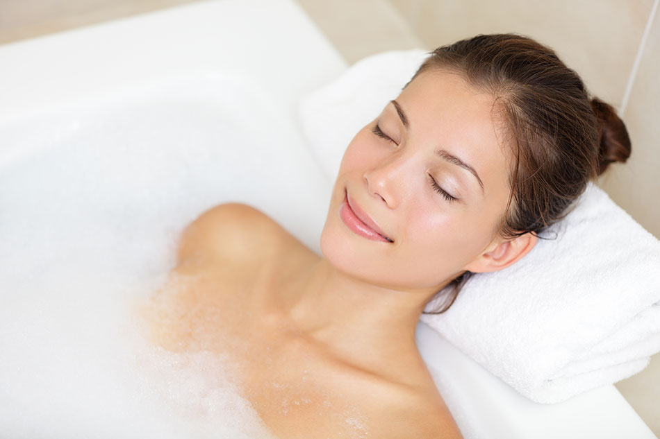 woman relaxing in bubble bath