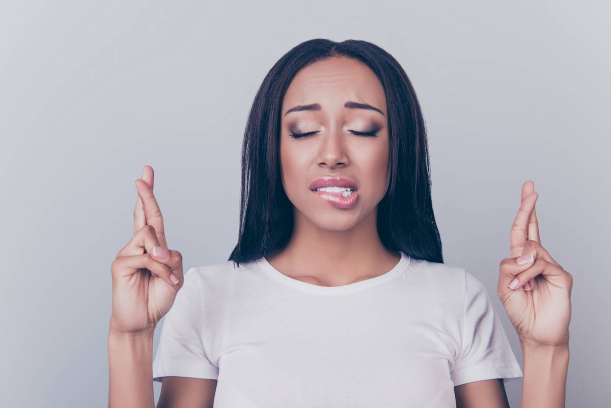 young woman nervous, thinking “Do I need to replace my contacts?”