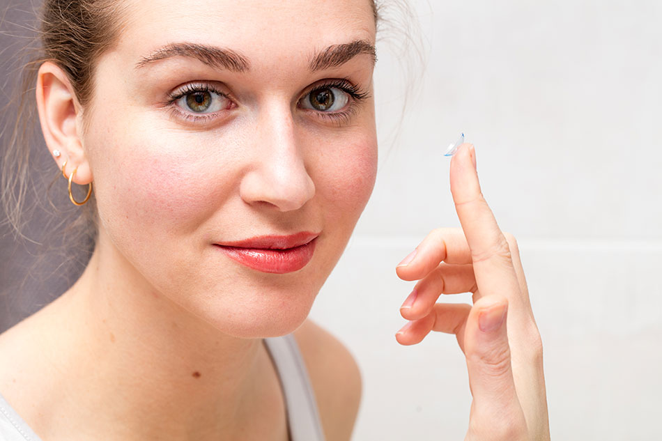 Young woman thinking to push contact lens expiration date